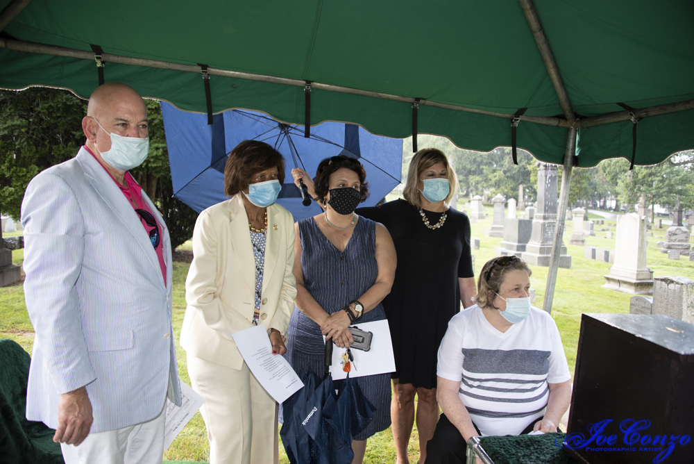 Ceremony under tent during rain. Joe Conzo, Jr, photo.