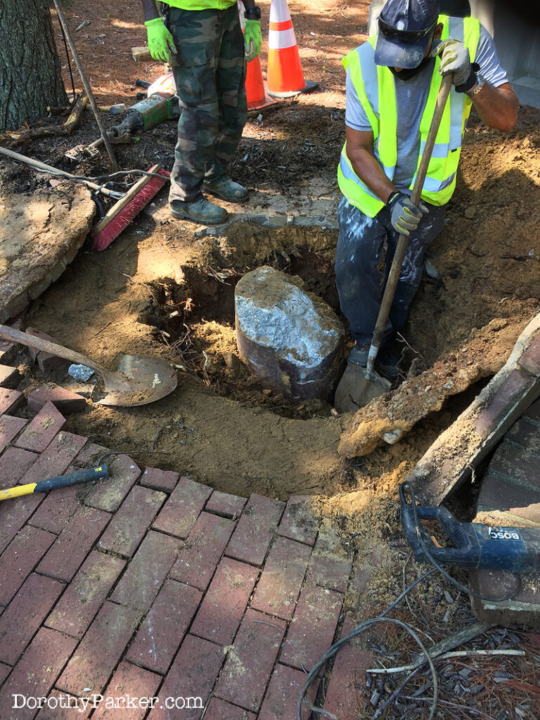 Crew works Aug. 18 in Baltimore to remove urn.